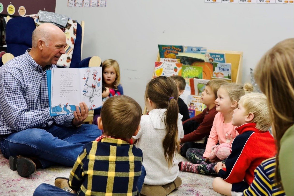 Gov. Gianforte reading to kids at PFL Learning Center in Livingston in the fall of 2022