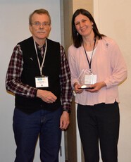 Montana Children's Trust Fund board chair David Landis with Pinwheels for Prevention Award recipient Jamie Marshall